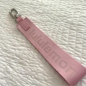 Lululemon never lost keychain in peony pink